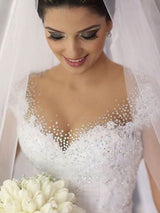 Ball Gown V-neck Sleeveless Tulle Floor Length Wedding Dress with Beading
